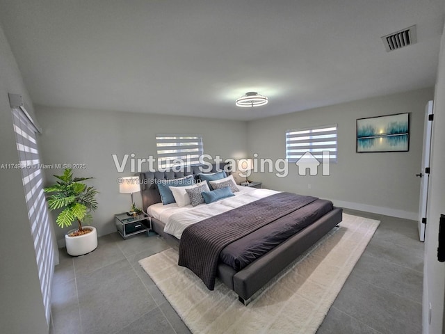 22274 SW 61st Ave, Boca Raton, FL 33428 - tiled bedroom with multiple windows