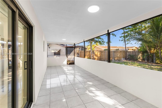 22274 SW 61st Ave, Boca Raton, FL 33428 - unfurnished sunroom with tile patterned flooring