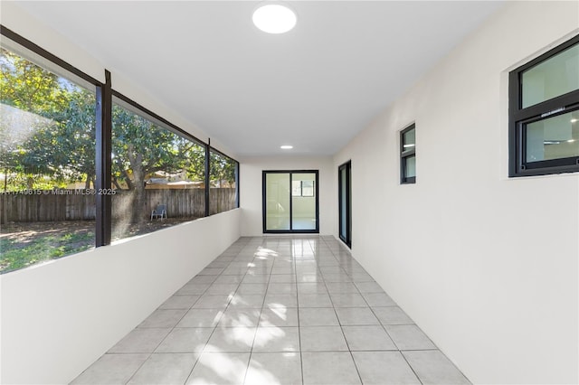 22274 SW 61st Ave, Boca Raton, FL 33428 - unfurnished sunroom featuring tile patterned floors, healthy amount of natural light, and recessed lighting