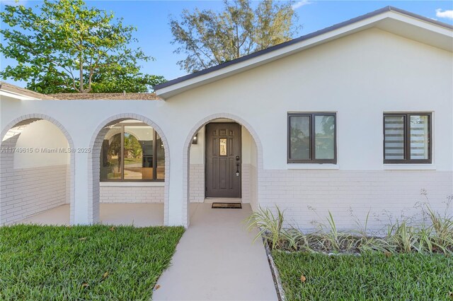 22274 SW 61st Ave, Boca Raton, FL 33428 - property entrance with brick siding and stucco siding