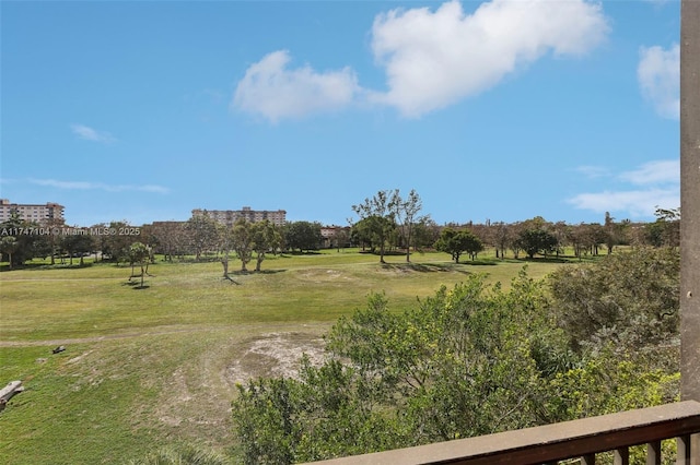 surrounding community featuring a lawn