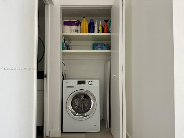 laundry room with washer / clothes dryer and laundry area