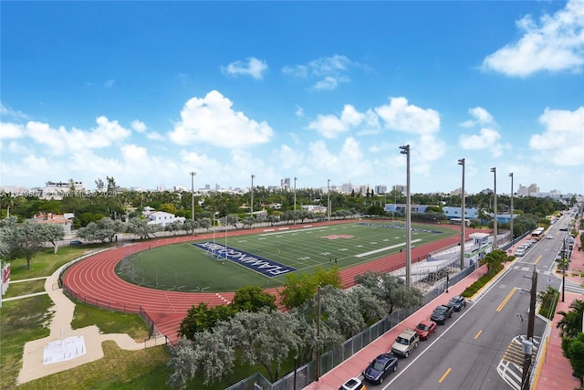 view of community featuring uncovered parking