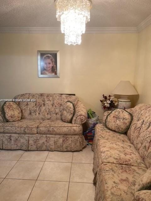 1350 SW 122nd Ave Unit 317, Miami, FL 33184 - living room with a textured ceiling, ornamental molding, light tile patterned flooring, and a notable chandelier