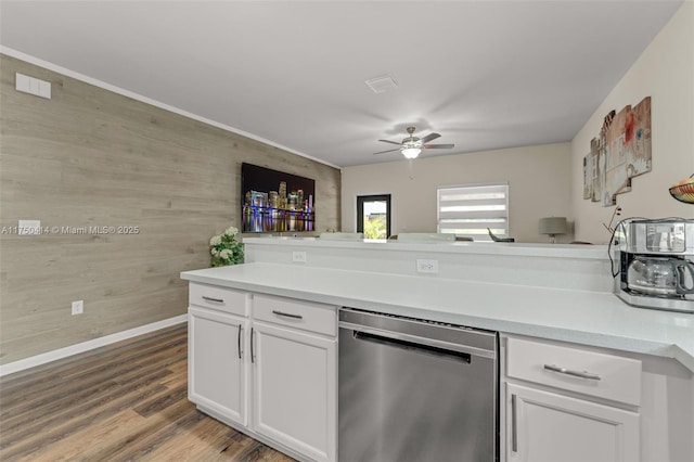 kitchen featuring wood finished floors, white cabinetry, a ceiling fan, light countertops, and dishwasher
