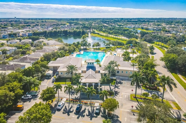 bird's eye view featuring a residential view and a water view