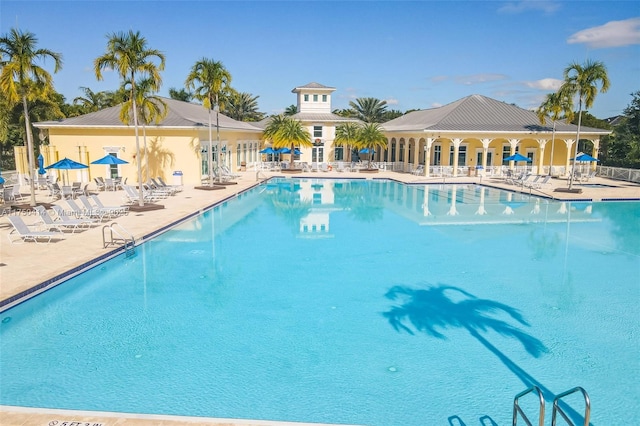 pool with a patio area