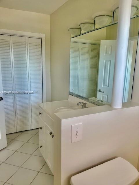 5050 Bayview Dr Unit 17, Fort Lauderdale, FL 33308 - half bath featuring vanity, toilet, and tile patterned floors