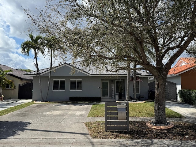 single story home featuring fence and stucco siding