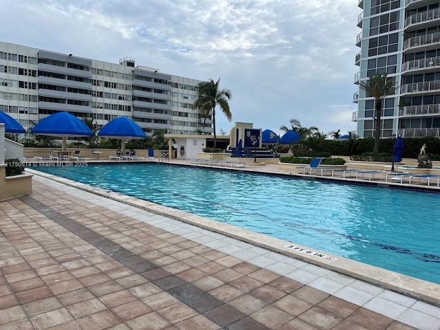 pool featuring a patio area