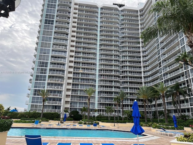 community pool featuring a patio area