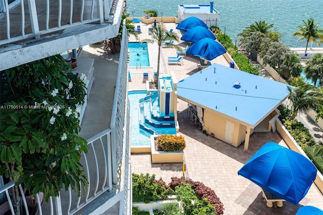 birds eye view of property featuring a water view