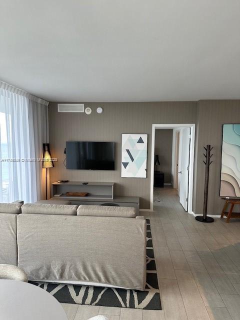 living area featuring wood finished floors