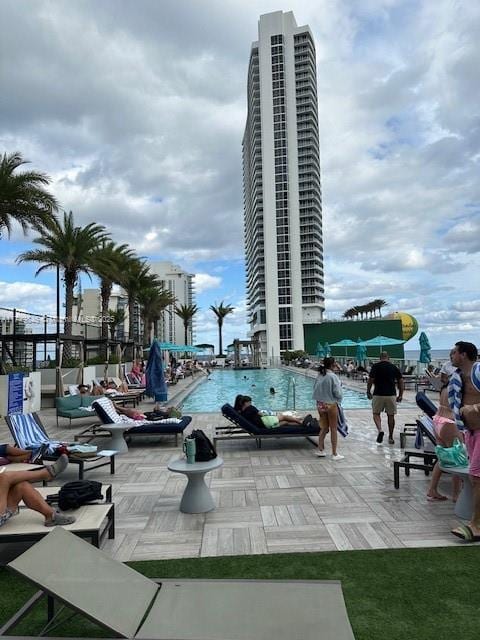 view of community with a patio area