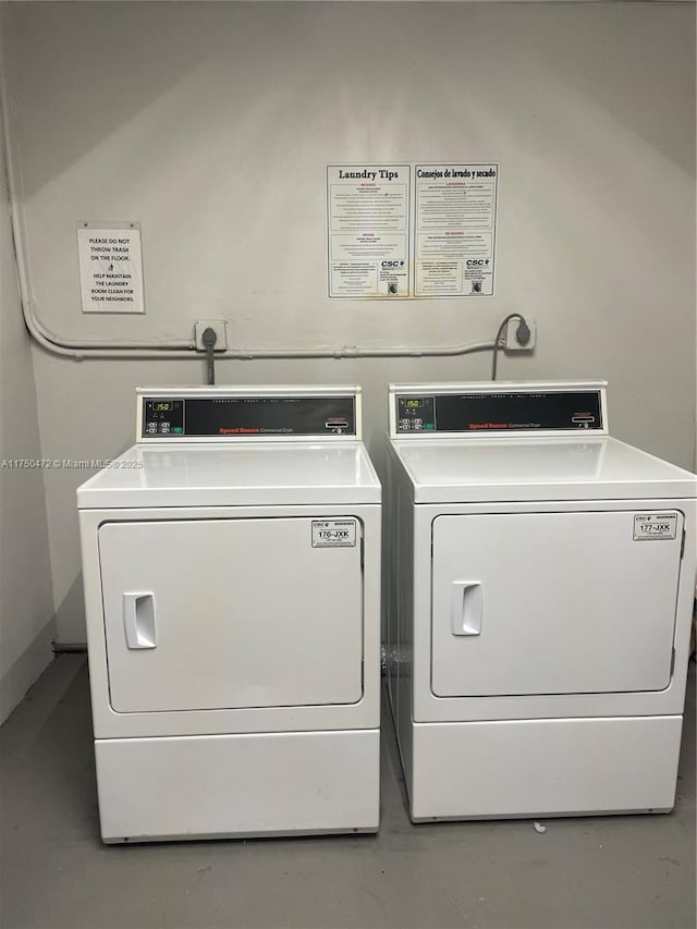 common laundry area with washing machine and clothes dryer