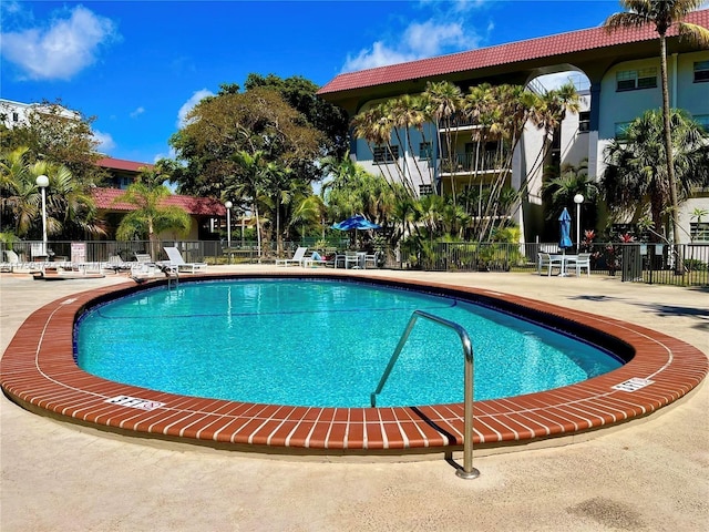 community pool with fence