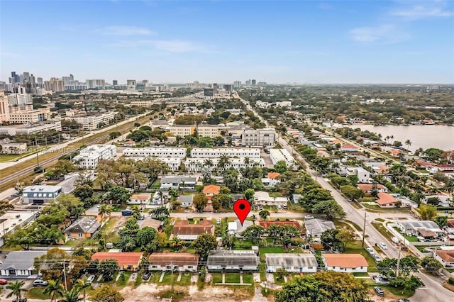 bird's eye view with a view of city and a water view