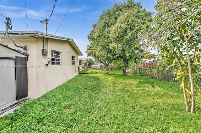 view of yard featuring fence