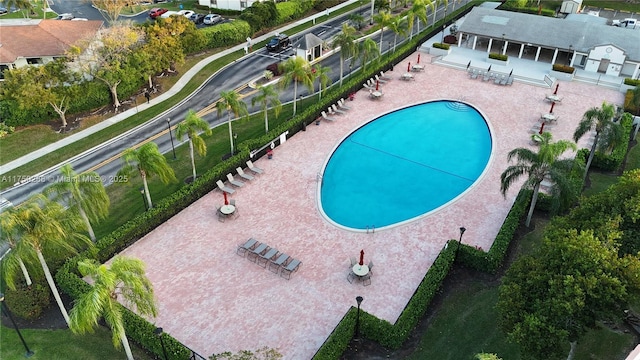 pool with a patio area