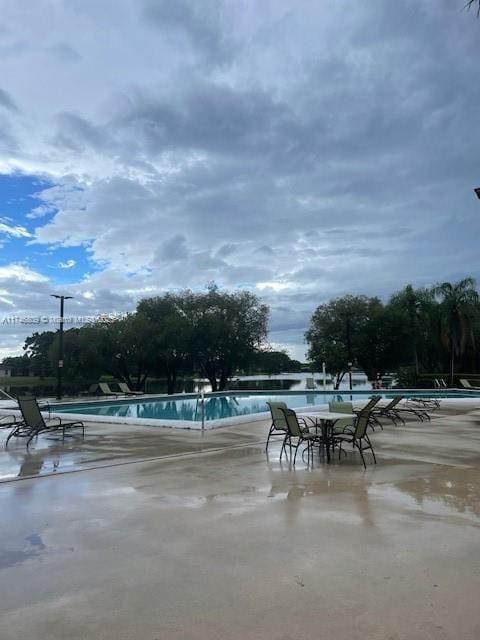 community pool featuring a patio