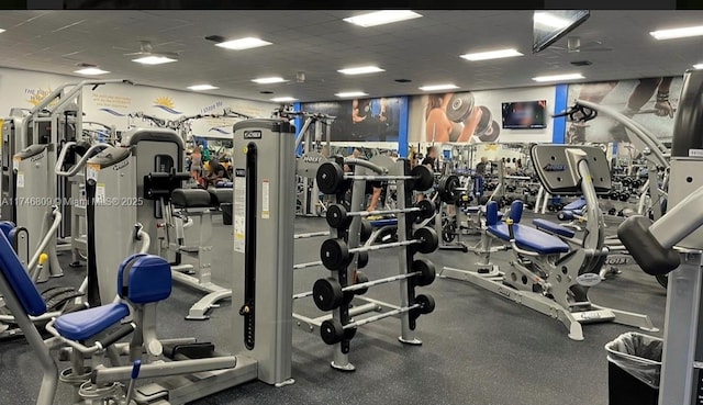exercise room with a drop ceiling