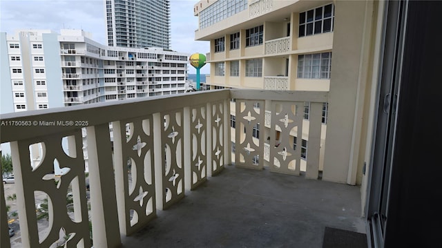 balcony featuring a view of city