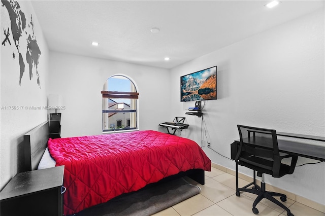 bedroom with tile patterned flooring and recessed lighting