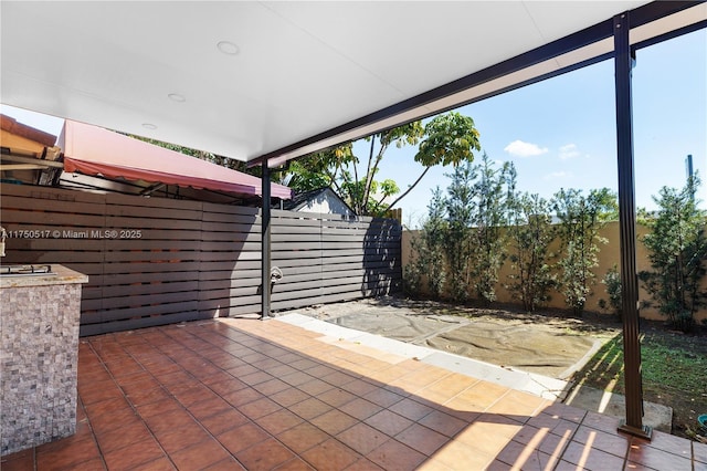 view of patio with fence