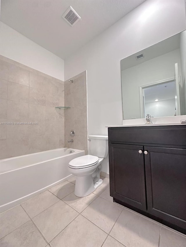 full bathroom featuring  shower combination, visible vents, toilet, and tile patterned floors