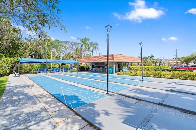 view of home's community with shuffleboard