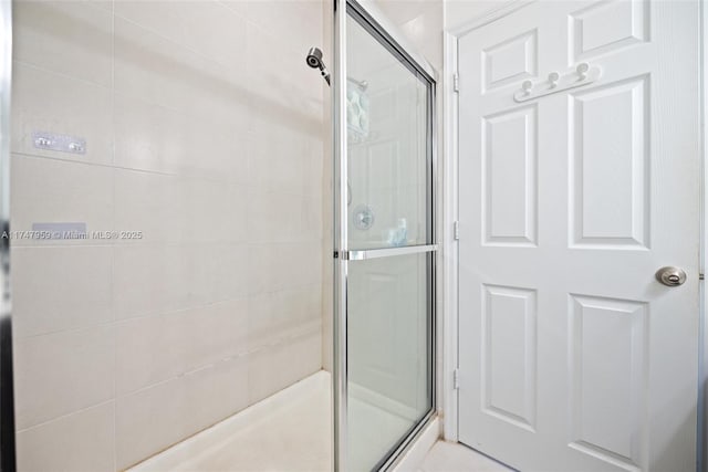 full bathroom with a stall shower