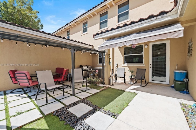view of patio with outdoor dining space