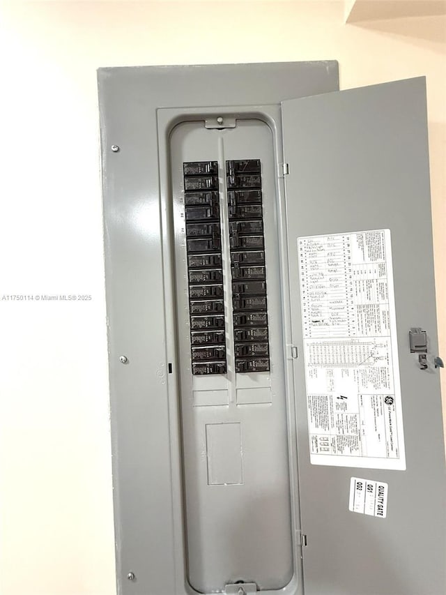 utility room with electric panel