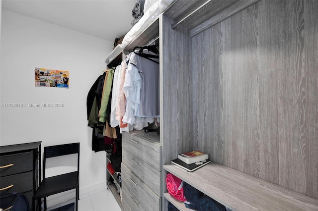 walk in closet featuring tile patterned floors