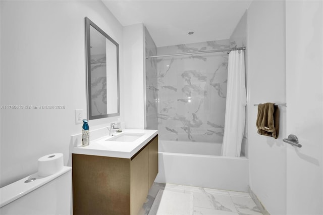 bathroom with marble finish floor, vanity, toilet, and shower / bath combo with shower curtain