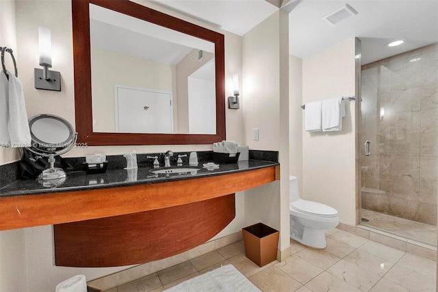 full bath featuring a stall shower, baseboards, visible vents, toilet, and vanity