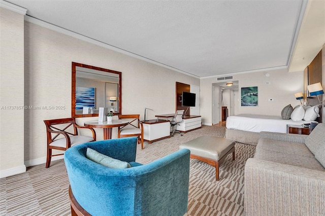 living area with baseboards, ornamental molding, visible vents, and light colored carpet