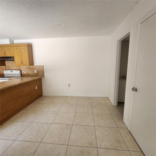 4149 Wimbledon Dr Unit 4149, Cooper City, FL 33026 - dining room featuring a textured ceiling and light tile patterned floors