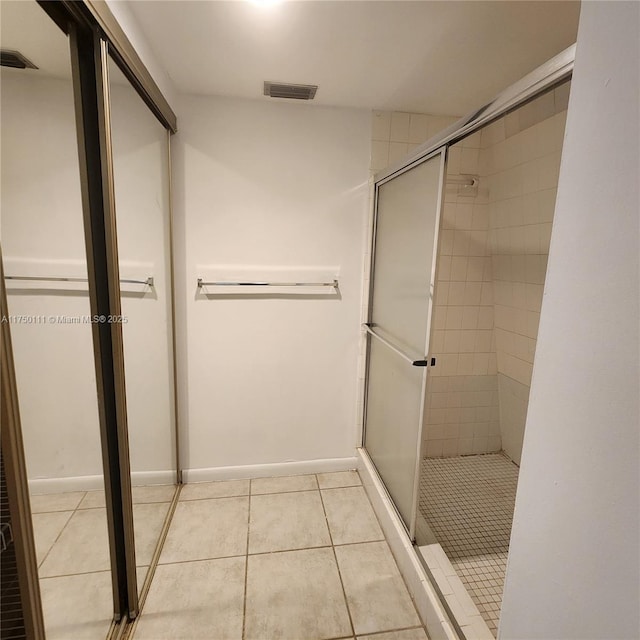 4149 Wimbledon Dr Unit 4149, Cooper City, FL 33026 - full bathroom with a shower stall, tile patterned floors, and baseboards