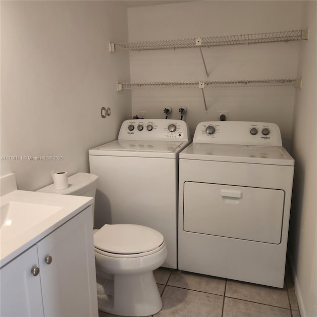 4149 Wimbledon Dr Unit 4149, Cooper City, FL 33026 - bathroom featuring washer and clothes dryer, tile patterned flooring, vanity, and toilet