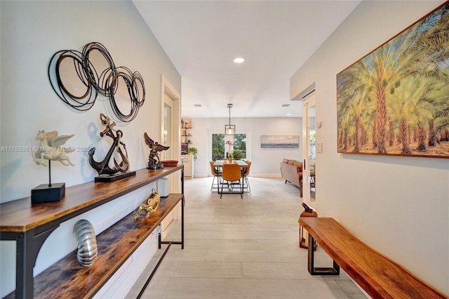 hallway with recessed lighting