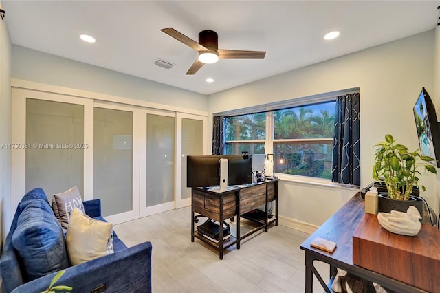 home office featuring a ceiling fan, recessed lighting, french doors, and visible vents