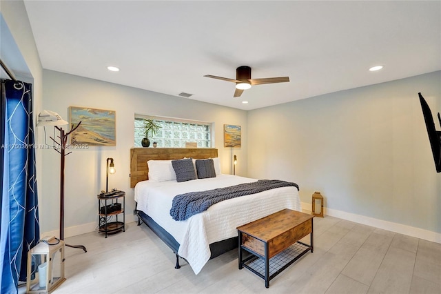 bedroom featuring ceiling fan, recessed lighting, baseboards, and light wood-style floors