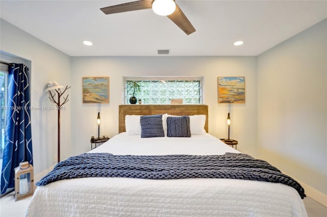 bedroom with ceiling fan, multiple windows, and recessed lighting