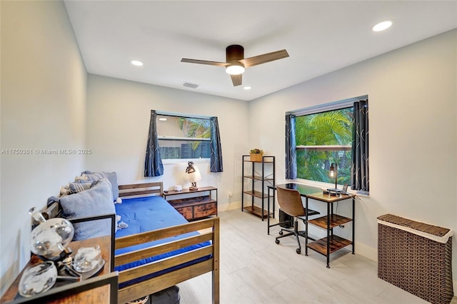 home office with a ceiling fan, recessed lighting, visible vents, and baseboards