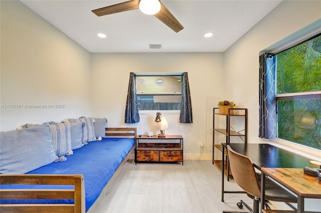 bedroom featuring recessed lighting, visible vents, a ceiling fan, wood finished floors, and baseboards