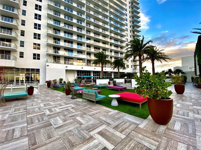 exterior space featuring a patio area and outdoor lounge area