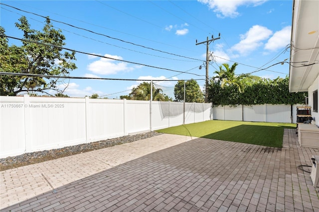 view of patio featuring a fenced backyard