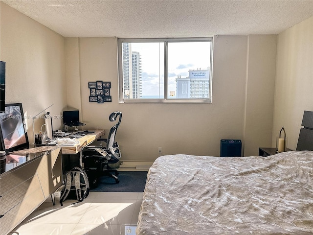 bedroom featuring a textured ceiling