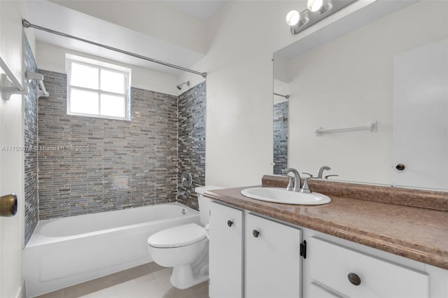 full bathroom with toilet, tile patterned flooring, shower / washtub combination, and vanity